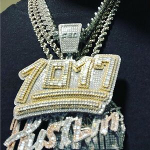 Iced out 1017 charm .